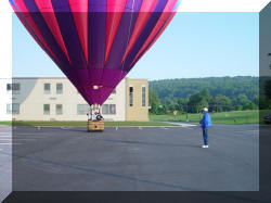 Test over, Mike takes a look at the balloon. I can hear his stomach growling from here...